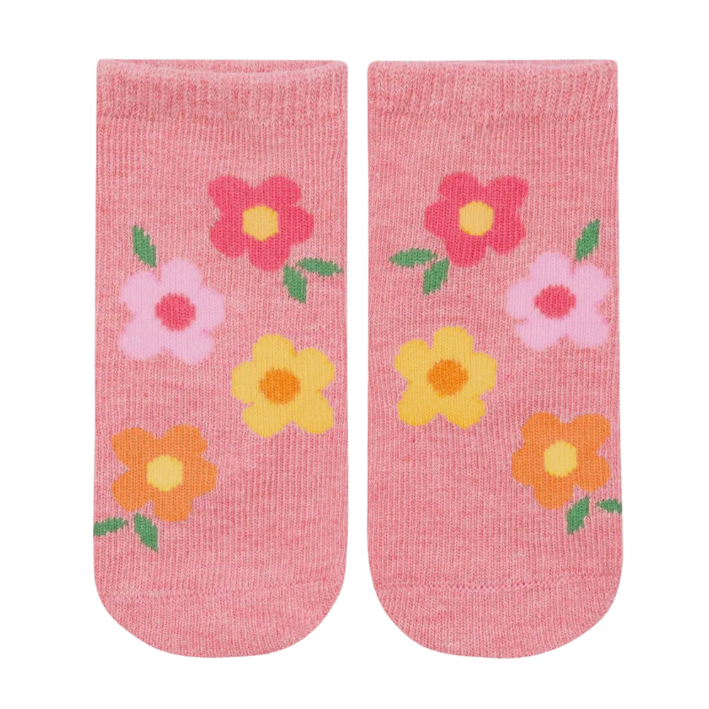 Pair of pink socks with floral designs on a light gray background