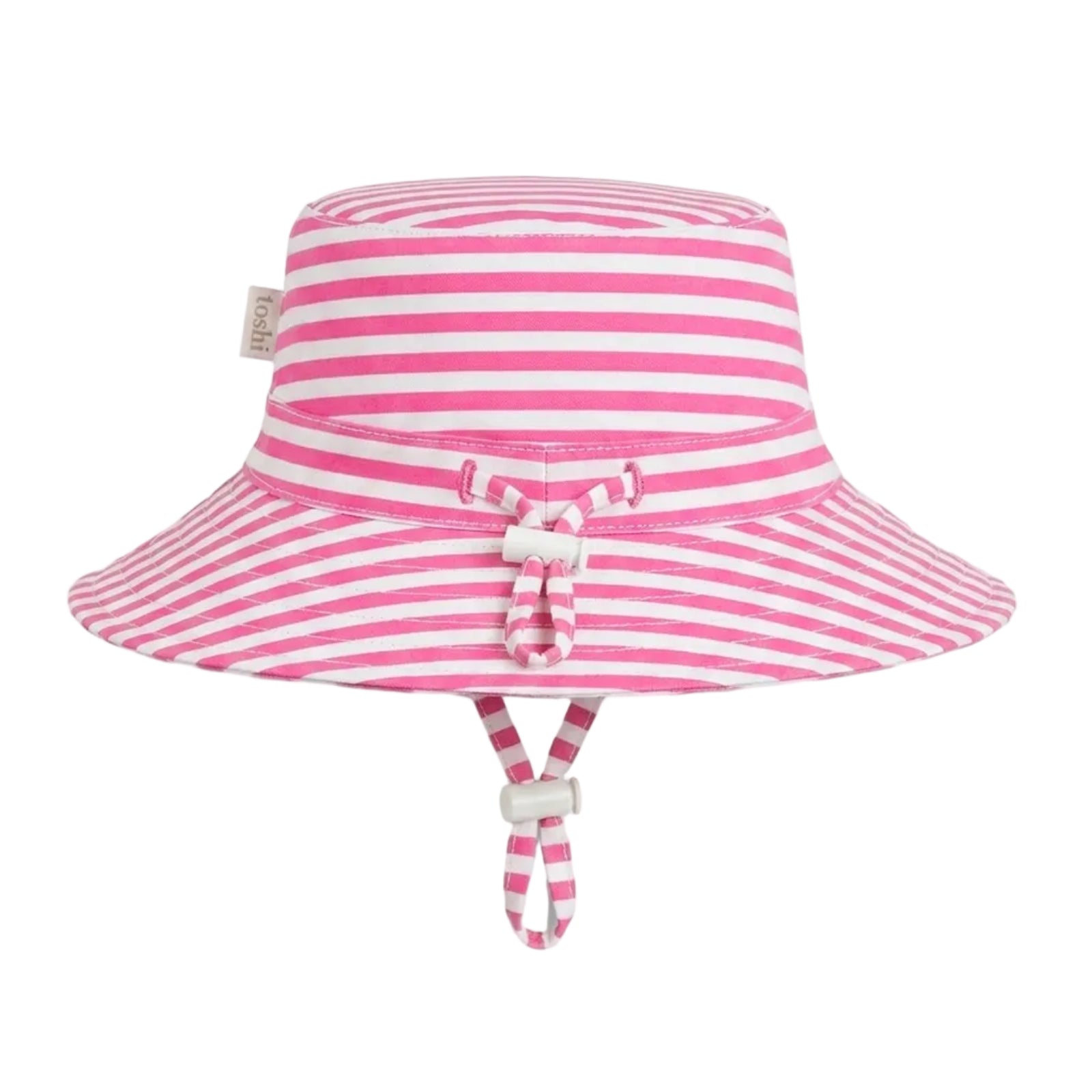 A pink and white striped kids 
bucket hat with a matching chin strap and a small bow detail on the front, shown against a light gray background.