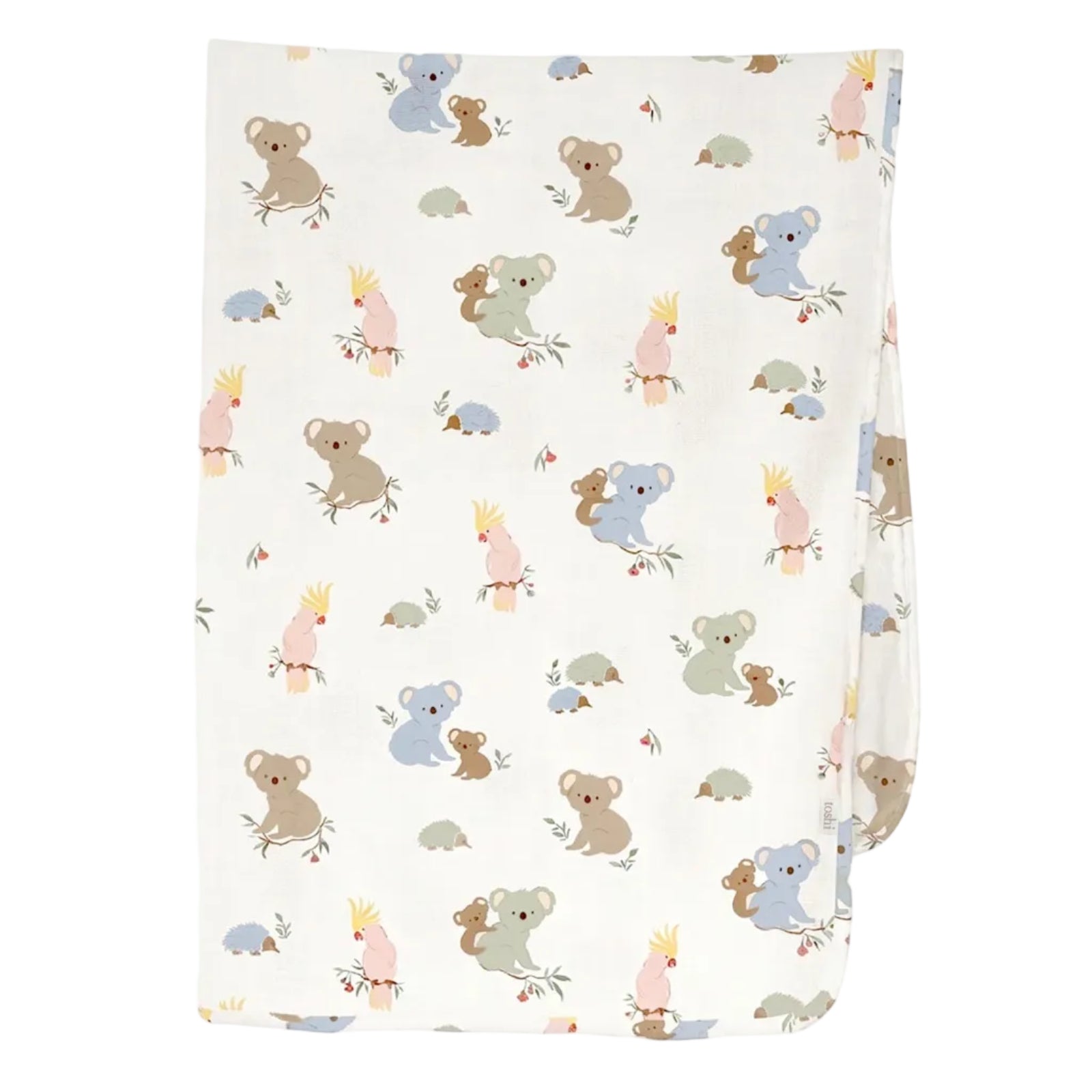 A folded white muslin baby blanket featuring a cute cartoon pattern of koalas, kangaroos, and possums in soft pastel colors, shown against a light gray background.