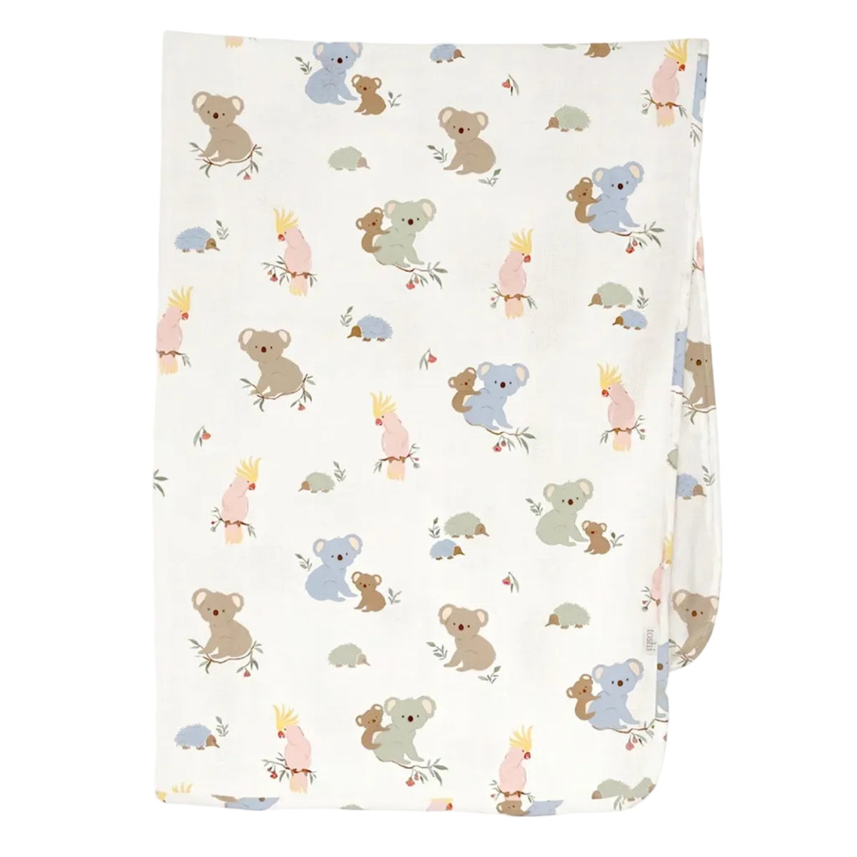 A folded white muslin baby blanket featuring a cute cartoon pattern of koalas, kangaroos, and possums in soft pastel colors, shown against a light gray background.