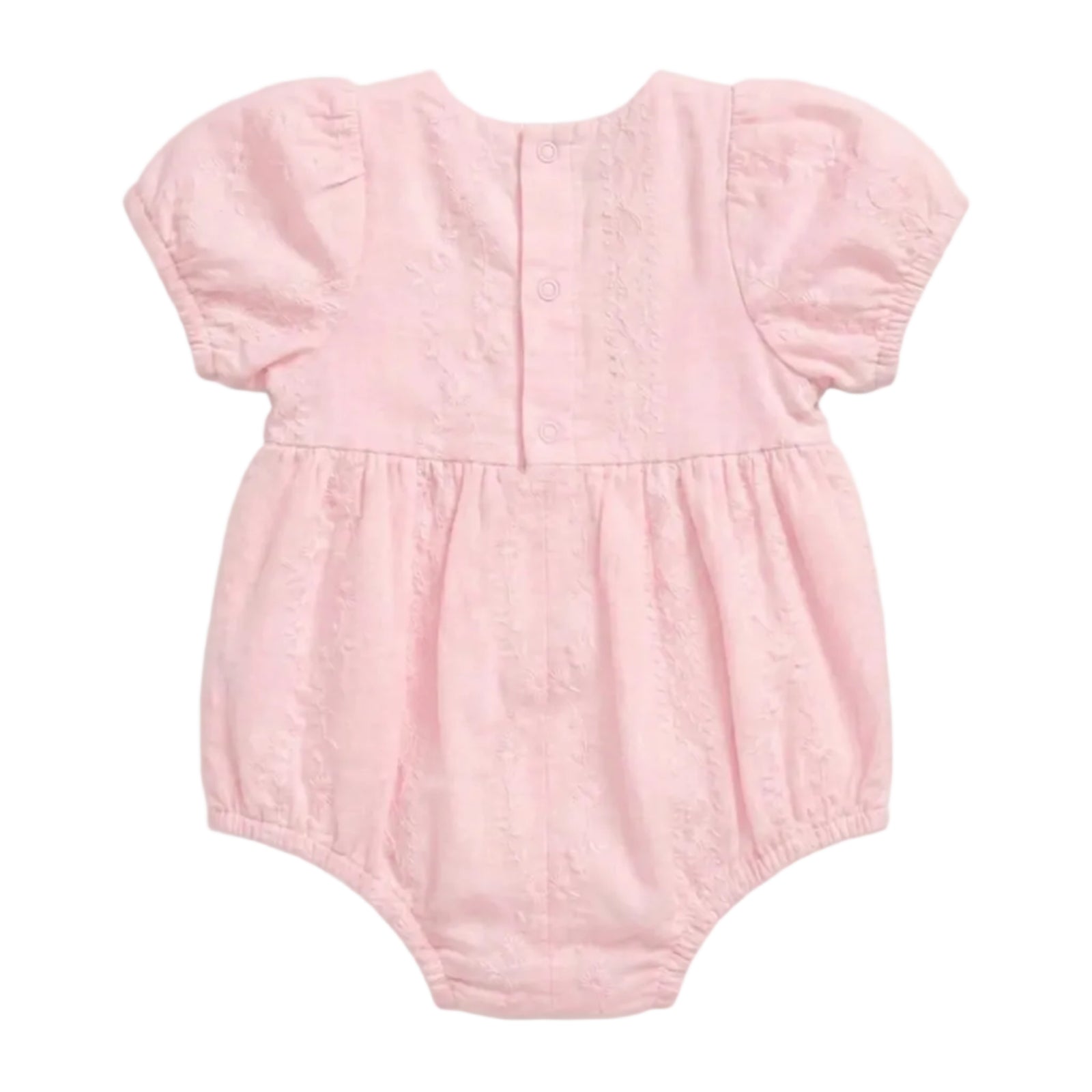 A light pink baby romper with short puff sleeves, a gathered waist, and a textured eyelet fabric, shown against a plain light gray background.