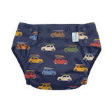 A navy blue reusable cloth swim nappy with a colorful pattern of retro cars and surfboards, featuring snap closures and a small white brand tag.