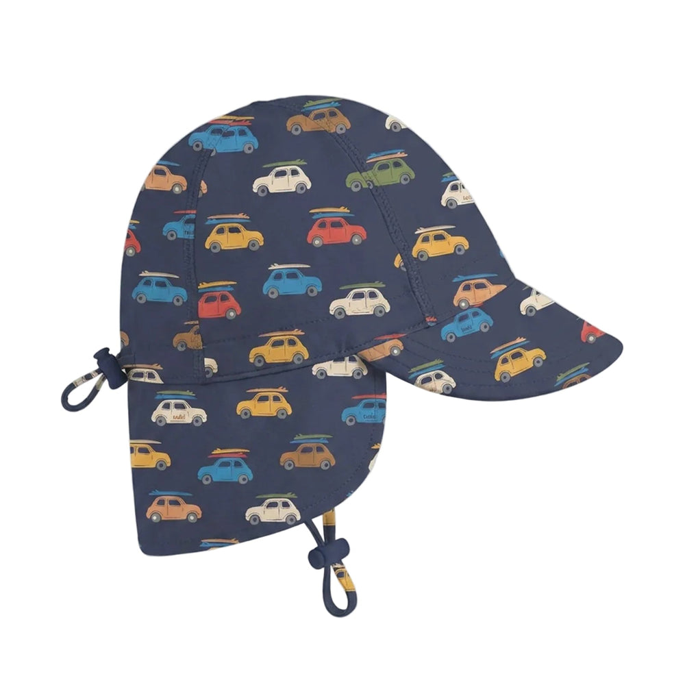 A navy blue sun swim hat with an all-over pattern of colorful vintage cars and surfboards, featuring a chin strap with a carabiner clip, shown on a light gray background.