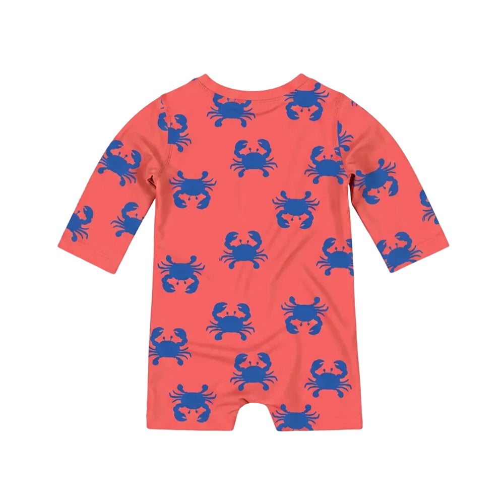 A coral orange long-sleeve baby swim onesie with a blue crab pattern, shown flat against a light gray background.