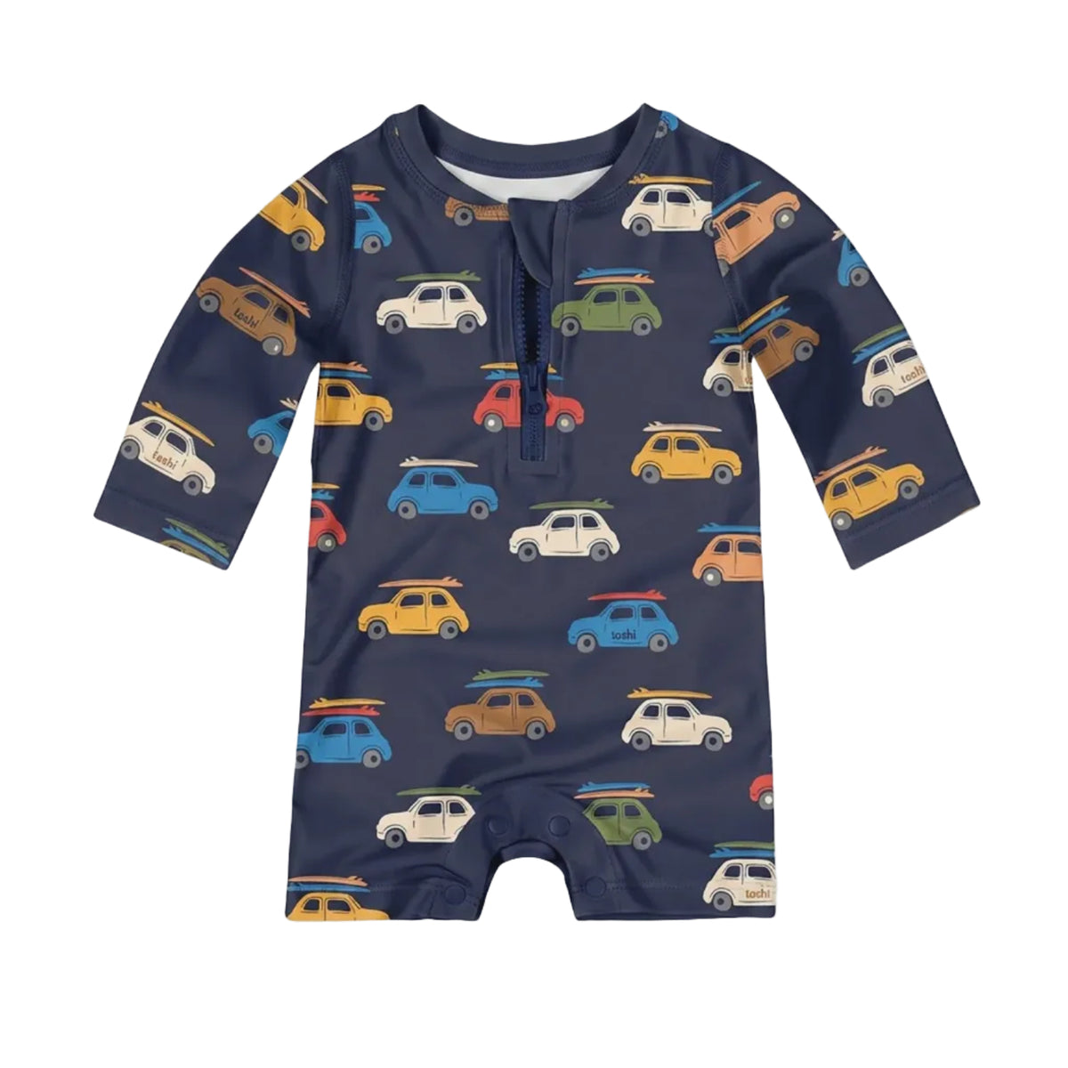 A long-sleeve baby romper in navy blue with an all-over pattern of colorful vintage cars and surfboards, shown against a light gray background.