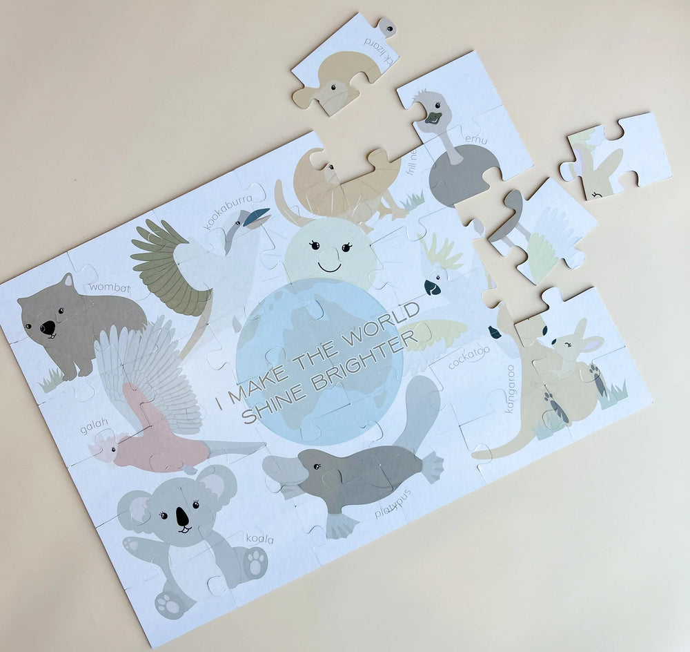 Children's puzzle with aussie animal illustrations on a beige background