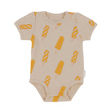 A short sleeve beige bodysuit with a pattern of icy poles in orange and yellow on the front.