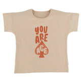 A buff-colored, relaxed fit t-shirt with an 'ace of spades' graphic print on the front.